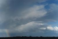 cumulonimbus with rainbow
