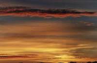 sunrise spectacle with layers of clouds