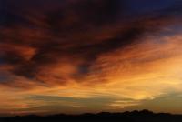 sunrise on cirrus over mountains