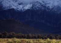 snow covered peaks wreathed in clouds