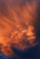 sunset clouds with virga and mammatus with polariser