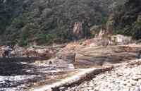 Storms River mouth footbridge and rocky beach