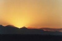 sunrise zoom with smoke plume