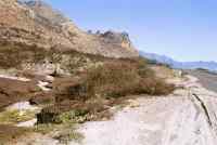 Mudslide removal in April on Boyes Drive following January fire